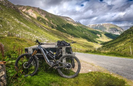 Photo for Mountain biking trip. Ebike MTB trip. Alps mountains. - Royalty Free Image