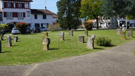 Photo for Cambo les Bains, Aquitaine, France April,7 , 2023: Cemetery around the church of Cambo les Bains - Royalty Free Image