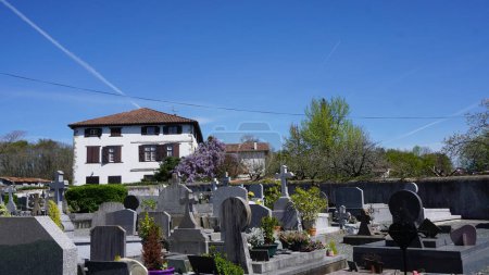 Photo for Ezpeleta, Aquitaine, France April,7 , 2023: Cemetery around the church of Ezpeleta - Royalty Free Image