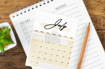 Photo for July 2023 Monthly calendar for 2023 year with  pencil. - Royalty Free Image