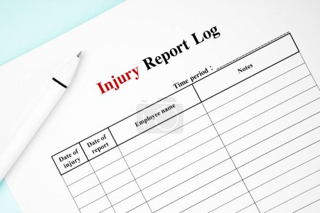 Photo for Blank Workplace Injury Report Form with pen. - Royalty Free Image