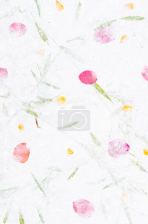 Handmade recycled flower and leaf paper background.