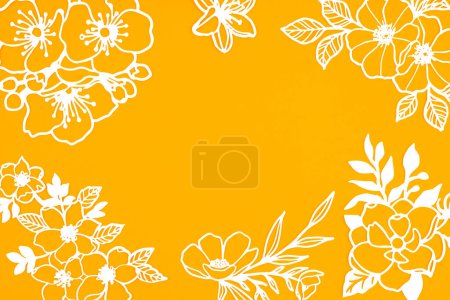 White paper cut plants leaves on yellow color background with copy space.