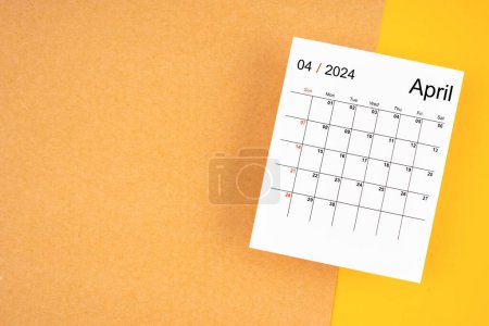 Calendar page for April 2024 on a yellow and brown background.
