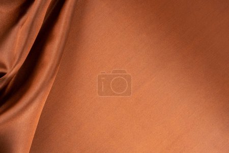 Téléchargez les photos : Brown background luxury cloth or wavy folds of grunge silk texture satin - en image libre de droit