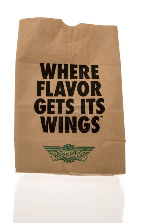 Photo for Winneconne, WI - 12 October 2023: A Wing Stop paper bag  on an isolated background - Royalty Free Image