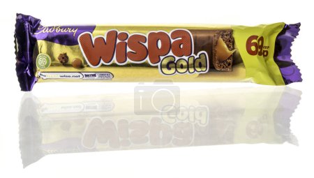 Photo for Winneconne, WI - 9 January 2024: A package of Cadbury Wispa gold candy bar on an isolated background. - Royalty Free Image