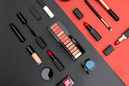 set decorative cosmetics on black and red background Poster 620984974