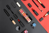 set decorative cosmetics on black and red background Poster #620984974