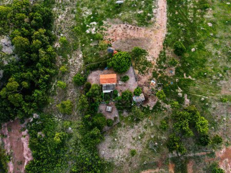 Aerial top down of house in the countryside during summer in Mato Grosso Brazil
