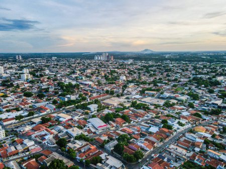 Aerial cityscape at sunset during summer in central Cuiaba Brazil