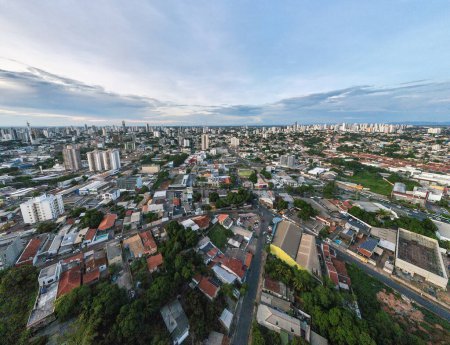 Aerial cityscape at sunset during summer in central Cuiaba Brazil