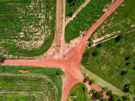 Aerial top down of dirt road intersection during summer in Nobres Bom Jardim Mato Grosso Brazil