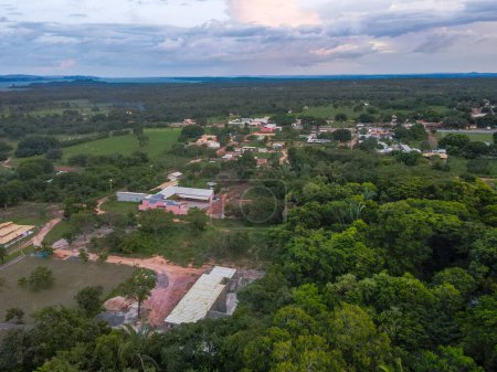 Aerial landscape of rainforest and village during summer in Nobres Bom Jardim Mato Grosso Brazil