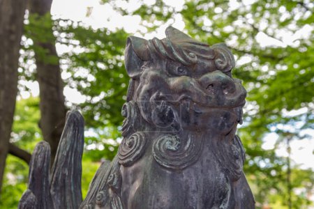 Photo for Komainu, or lion-dog, statue at Asanogawa inari jinja, Kanazawa, Japan. - Royalty Free Image
