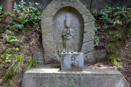 Photo for Stone statue (public art) of bodhisattva. Kanazawa, Japan. TRANSLATION: Number 20. - Royalty Free Image