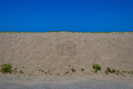 Photo for Abstract view of sand dune and summer blue sky, Kanaiwa, Kanazawa, Ishikawa Prefecture, Japan. - Royalty Free Image