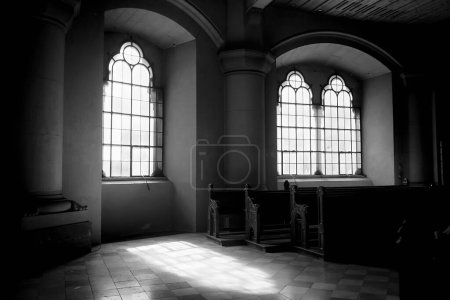 Photo for The sunlight shines beautifully through the windows of an old church in Munich, Germany. - Royalty Free Image