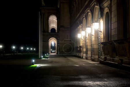 Photo for A nocturnal detail of an old palace in Munich, Germany. The walls have been lit beautifully by the old lanterns. - Royalty Free Image