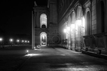 Photo for A nocturnal detail of an old palace in Munich, Germany. The walls have been lit beautifully by the old lanterns. - Royalty Free Image