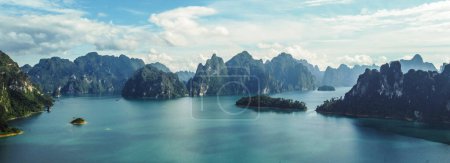 Real aerial photo of beautiful Khao Sok in Thailand. Scenic mountains on the lake in National Park, Drone shot, top view, Asia.