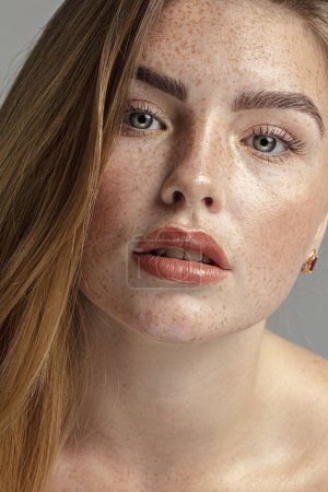 Photo for Beautiful natural woman with freckles on face and body, delicate look. - Royalty Free Image