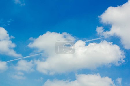 Clouds floating in blue sky, natural background.