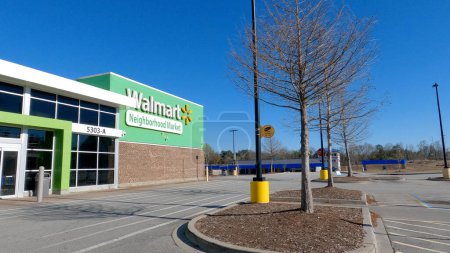 Photo for Grovetown, Ga USA - 12 25 22: Walmart grocery store exterior clear blue sky - Royalty Free Image