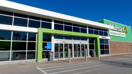 Photo for Grovetown, Ga USA - 12 25 22: Walmart grocery store exterior clear blue sky green trim door entrance - Royalty Free Image