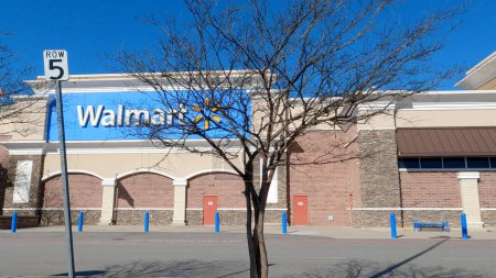 Photo for Grovetown, Ga USA - 12 25 22: Walmart supercenter exterior clear blue sky road to back of building - Royalty Free Image