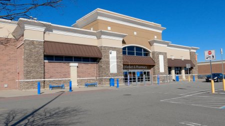 Photo for Grovetown, Ga USA - 12 25 22: Walmart grocery store exterior clear blue sky building side - Royalty Free Image