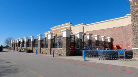 Photo for Grovetown, Ga USA - 12 25 22: Walmart grocery store exterior clear blue sky vending machines - Royalty Free Image