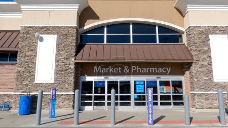 Photo for Grovetown, Ga USA - 12 25 22: Walmart supercenter exterior clear blue sky modern windows - Royalty Free Image
