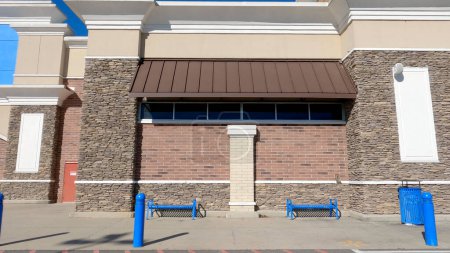 Photo for Grovetown, Ga USA - 12 25 22: Walmart grocery store exterior clear blue sky - Royalty Free Image