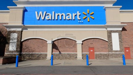 Photo for Grovetown, Ga USA - 12 25 22: Walmart supercenter exterior clear blue sky blue logo - Royalty Free Image