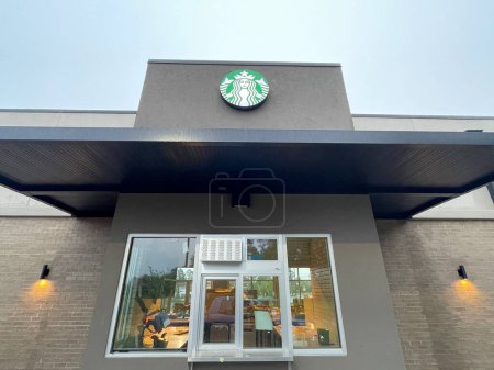 Photo for Grovetown, Ga USA - 04 30 23: NEW Starbucks restaurant exterior drive thru window - Royalty Free Image