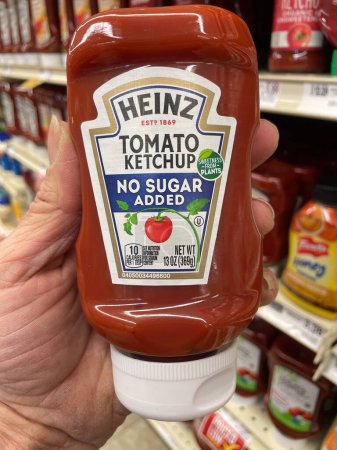 Photo for Grovetown, Ga USA - 03 23 23: Food Lion grocery store Heinz tomato ketchup no sugar added - Royalty Free Image
