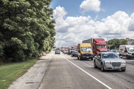 Photo for Gwinnett County, Ga USA - 07 08 20: Traffic jam on the interstate at Beaver Ruin Road back view - Royalty Free Image
