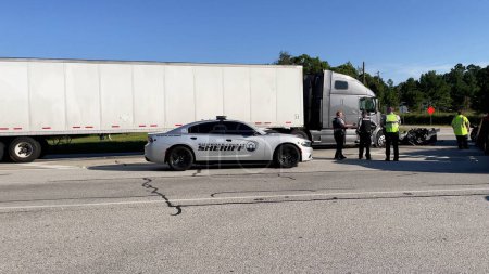 Photo for Augusta, Ga USA - 09 23 2021: Semi truck and pickup truck collision car wreck and Police officers on scene on Highway 1 - Royalty Free Image
