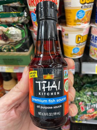 Photo for Grovetown, Ga USA - 08 19 23: Walmart retail store interior Thai Kitchen fish sauce - Royalty Free Image