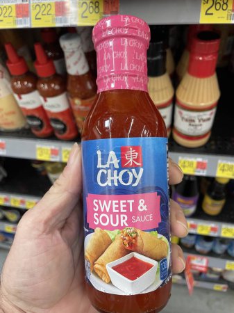 Photo for Grovetown, Ga USA - 08 19 23: Walmart retail store interior La Choy sweet and sour sauce - Royalty Free Image