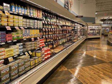 Photo for Grovetown, Ga USA - 04 23 22: Food Lion grocery store dairy shelves full and neat - Royalty Free Image