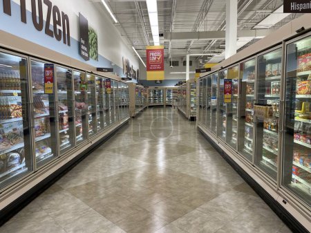 Photo for Grovetown, Ga USA - 04 23 22: Food Lion grocery store frozen food aisles clear and clean - Royalty Free Image