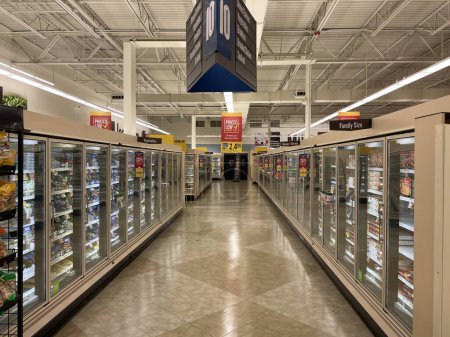 Photo for Grovetown, Ga USA - 04 23 22: Food Lion grocery store looking at shiny floor frozen foods - Royalty Free Image