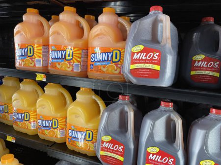 Photo for Grovetown, Ga USA - 09 08 23: Walmart grocery store Sunny D orange drink and Milos Tea - Royalty Free Image