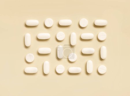 Téléchargez les photos : Mélange de pilules médicales blanches en ligne sur la vue de dessus beige clair. Médecine et concept de santé, compléments alimentaires et vitamines. Produits pharmaceutiques assortis - en image libre de droit
