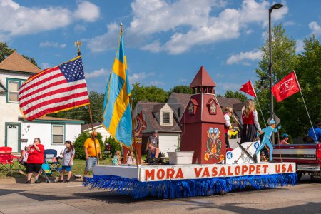 Photo for Mora, Minnesota USA July 30, 2022  Parade in Mora, Minnesota for the Kanabec County Fair. Mora Vasaloppet USA float representing the Scandinavian Swedish ancestry in the area. - Royalty Free Image