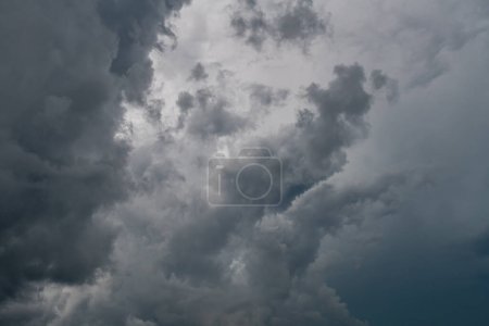 Photo for Gray storm clouds before the rain starts in Minnesota in the summer. - Royalty Free Image