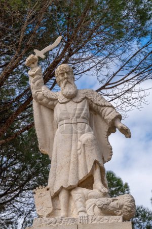 Photo for Haifa, Israel April 2, 2023 The statue of Elijah slaughtering a Baal prophet in the courtyard of Muhraqa Monastery on Mount Carmel in Israel. - Royalty Free Image