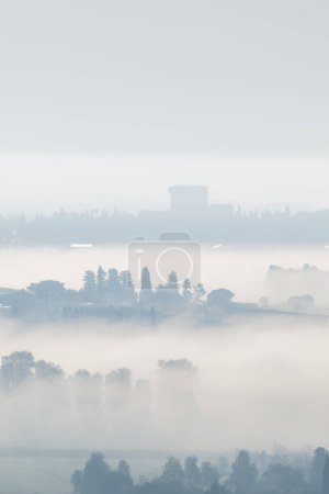 Photo for View of a Kfar Yehoshua and the Jezreel Valley on a foggy morning from the hill at Bet Shearim in Kiryat Tivon, Israel. - Royalty Free Image